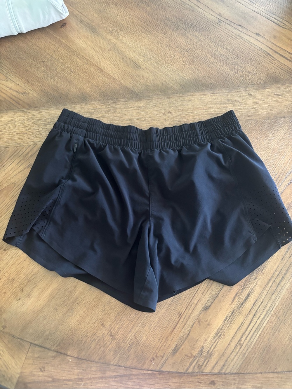 Athleta Black Women's Athletic Shorts with Perforated Side Panels